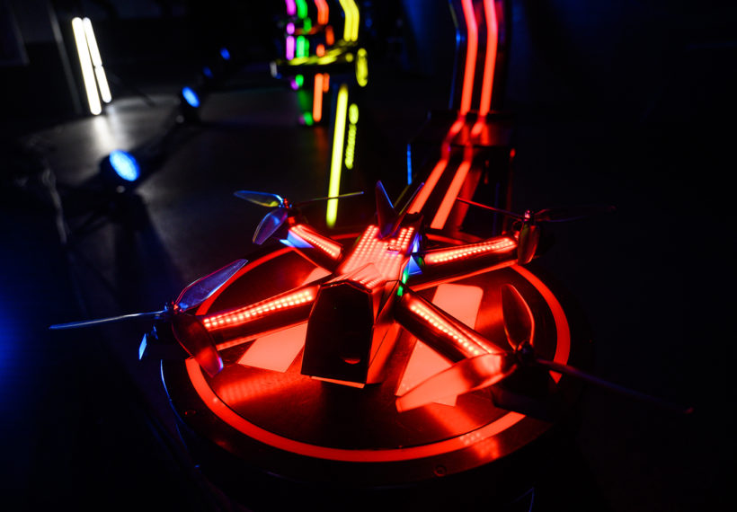 Drone Racing League’s Photo of a Drone Sitting on a Podium.