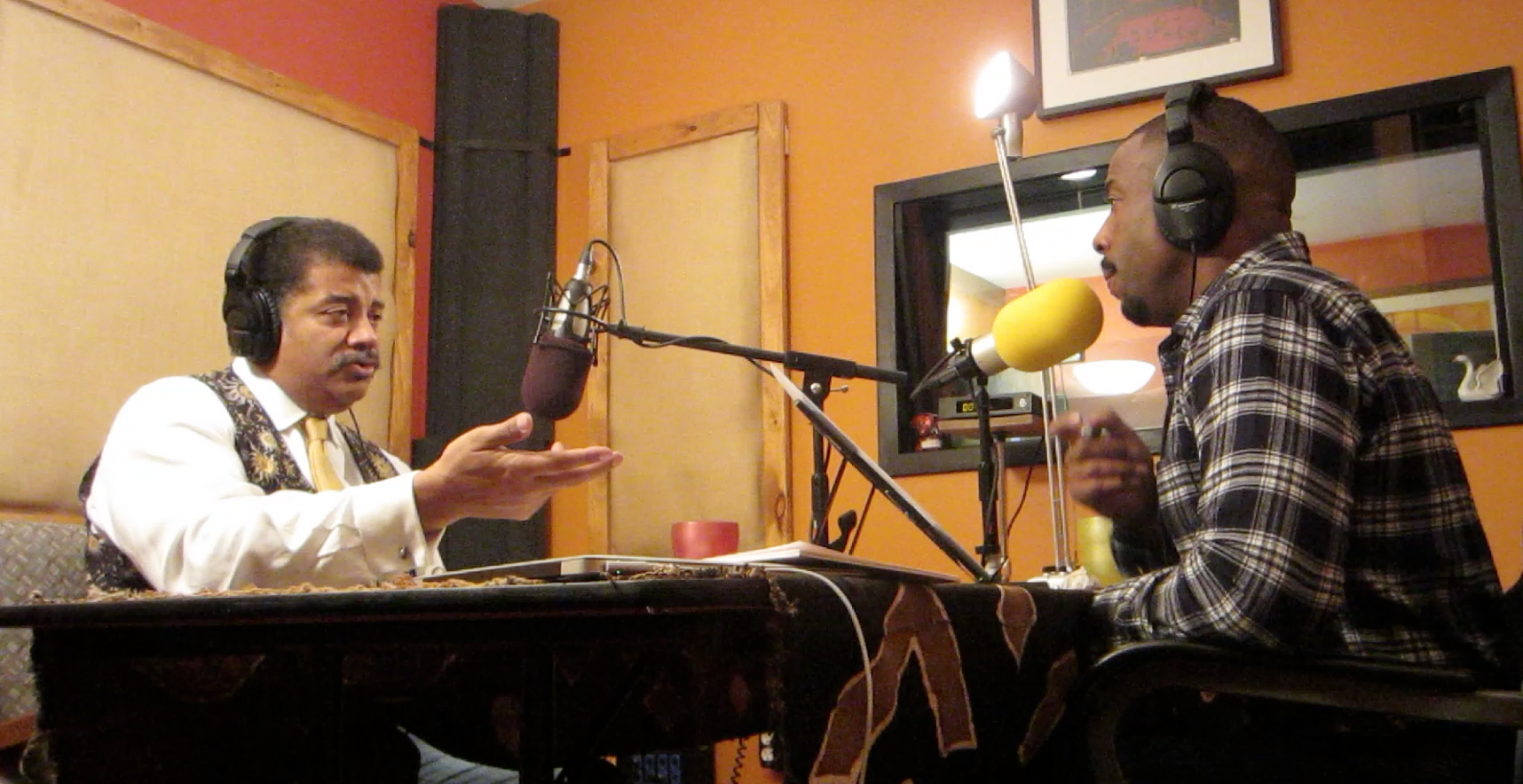 Neil deGrasse Tyson and comedian Chuck Nice in the studio