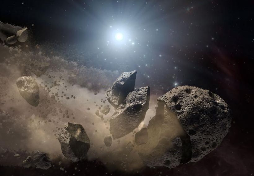 Dead star, or "white dwarf," surrounded by the bits and pieces of a disintegrating asteroid