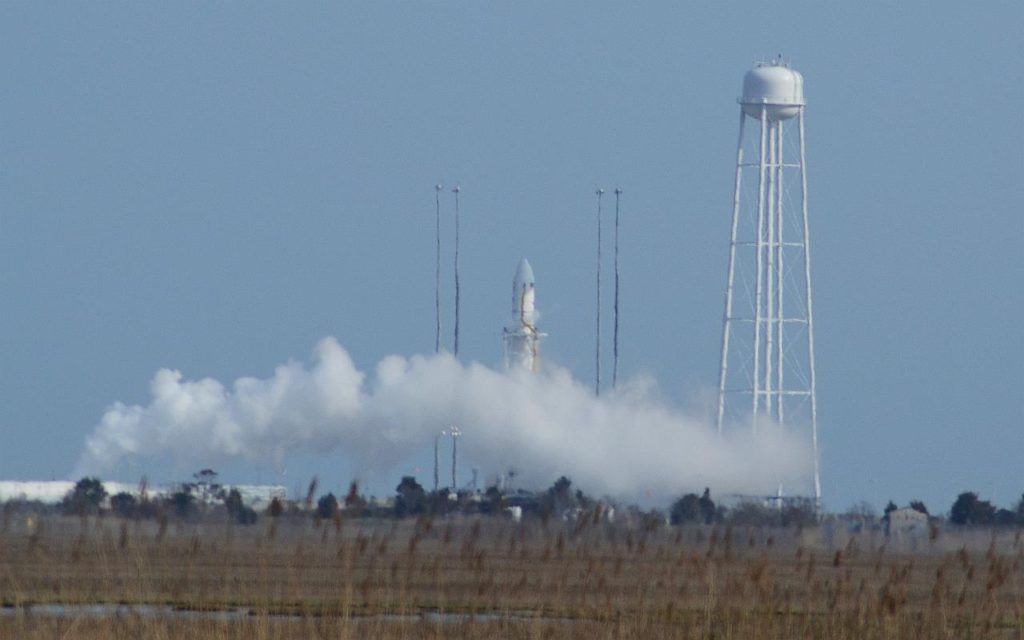Photo of liquid oxygen being purged on the pad after abort. 