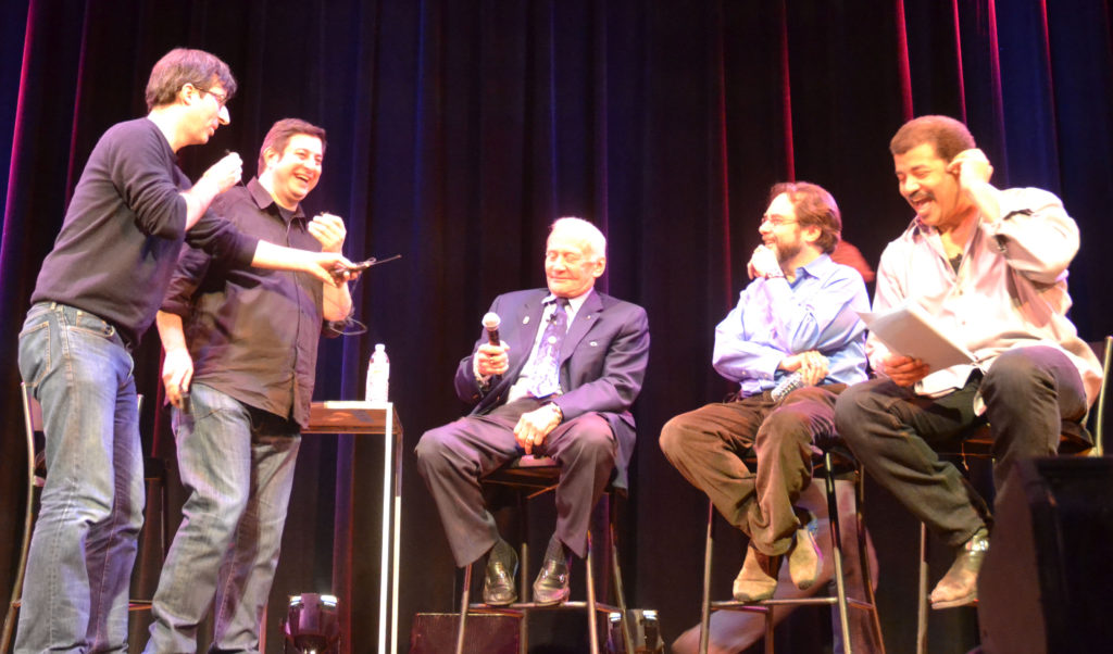 Photo of Buzz Aldrin, John Oliver, Eugene Mirman, Neil deGrasse Tyson and Andrew Chaikin at StarTalk Live at Town Hall. Credit: Stacey Severn.
