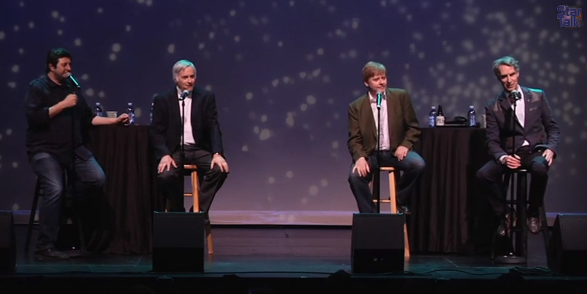 Photo of StarTalk Live! onstage at SF Sketchfest, showing, from left to right, Eugene Mirman, Seth Shostak, Dave Foley, and Bill Nye