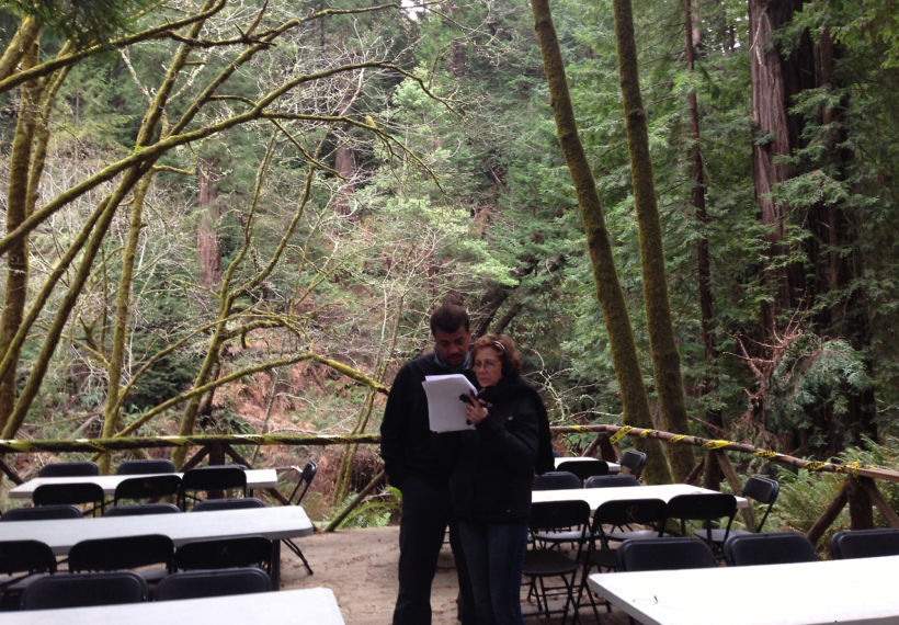 Photo of Neil deGrasse Tyson and Ann Druyan reviewing script on location, taken by Sarah Mozal.