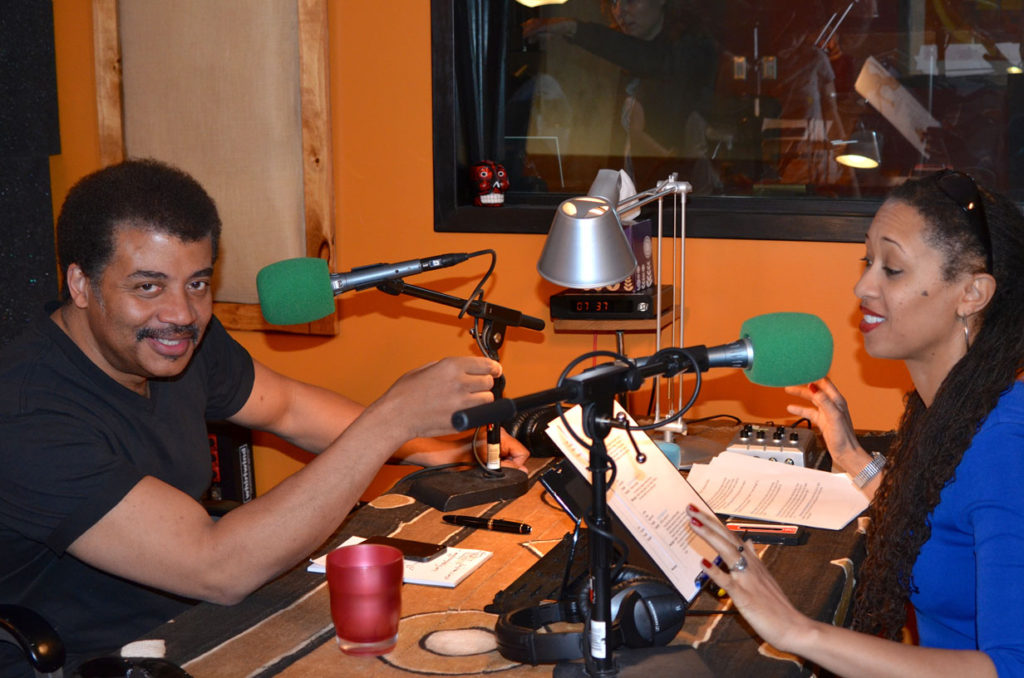 Photo of Neil deGrasse Tyson and Leighann Lord in a studio recording session for StarTalk Radio, taken by Jeffrey Simons.