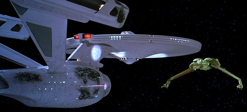 Screen capture from the movie Star Trek III: The Search for Spock showing the USS Enterprise vs. a Klingon Bird of Prey. © 2015 CBS Studios Inc All Rights Reserved. STAR TREK and related marks are trademarks of CBS Studios Inc.