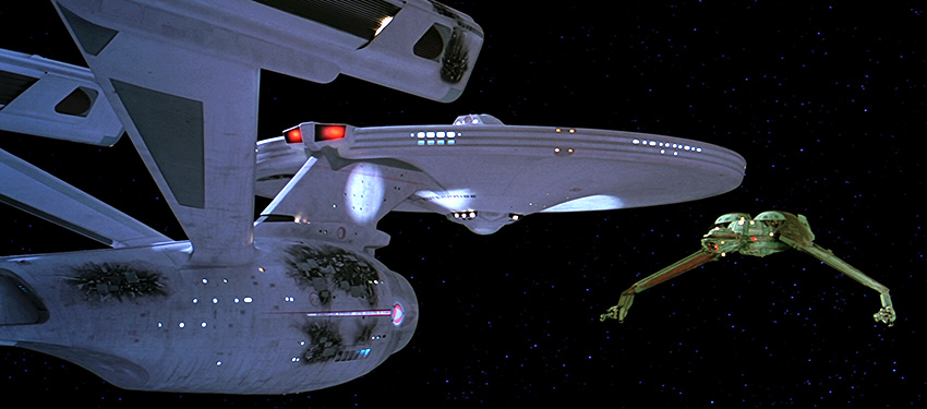 Screen capture from the movie Star Trek III: The Search for Spock showing the USS Enterprise vs. a Klingon Bird of Prey. © 2015 CBS Studios Inc All Rights Reserved. STAR TREK and related marks are trademarks of CBS Studios Inc.