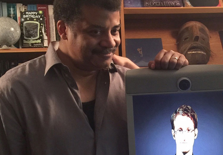 Photograph of Neil deGrasse Tyson standing next to Edward Snowden's virtual telepresence robot, taken by Josh Bell of the ACLU.