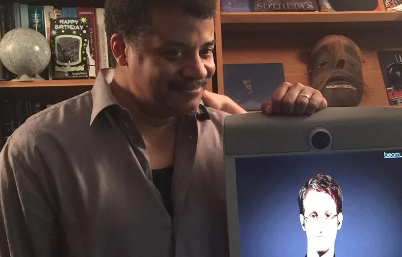 Photograph of Neil deGrasse Tyson standing next to Edward Snowden's virtual telepresence robot, taken by Josh Bell of the ACLU.