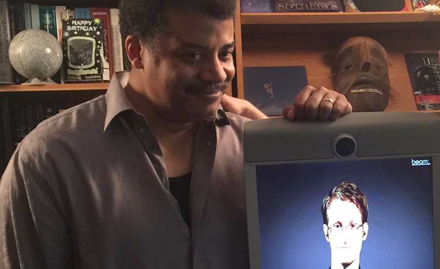 Photograph of Neil deGrasse Tyson standing next to Edward Snowden's virtual telepresence robot, taken by Josh Bell of the ACLU.
