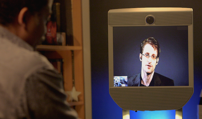 Photo of Neil deGrasse Tyson interviewing Edward Snowden via telepresence, taken by Carlos Valdes-Lora.