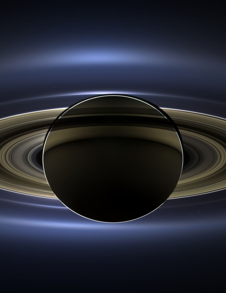 "The Day the Earth Smiled" - a photo of the planet Saturn, with Earth in the very distant background, taken by Cassini. Credit: NASA/JPL-Caltech/SSI.