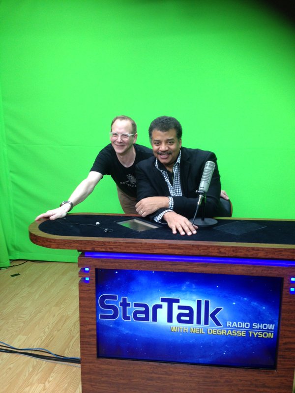 Photo of Scott Holden and Neil deGrasse Tyson being filmed for "What's A Podcast? A Documentary Film".