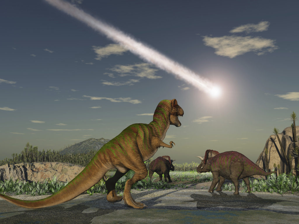Artist's impression of the asteroid that killed the dinosaurs, along with said dinosaurs, for a StarTalk Radio blog post. Credit: estt/iStock.