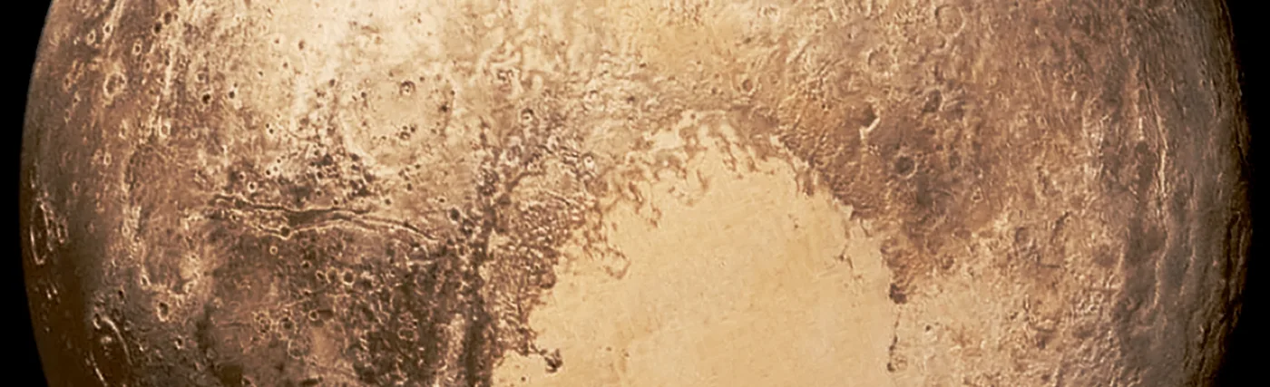 Photo showing Pluto's heart, in natural color, by NASA/Johns Hopkins University Applied Physics Laboratory/Southwest Research Institute.