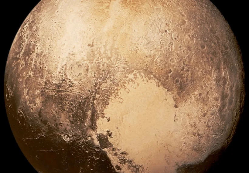 Photo showing Pluto's heart, in natural color, by NASA/Johns Hopkins University Applied Physics Laboratory/Southwest Research Institute.
