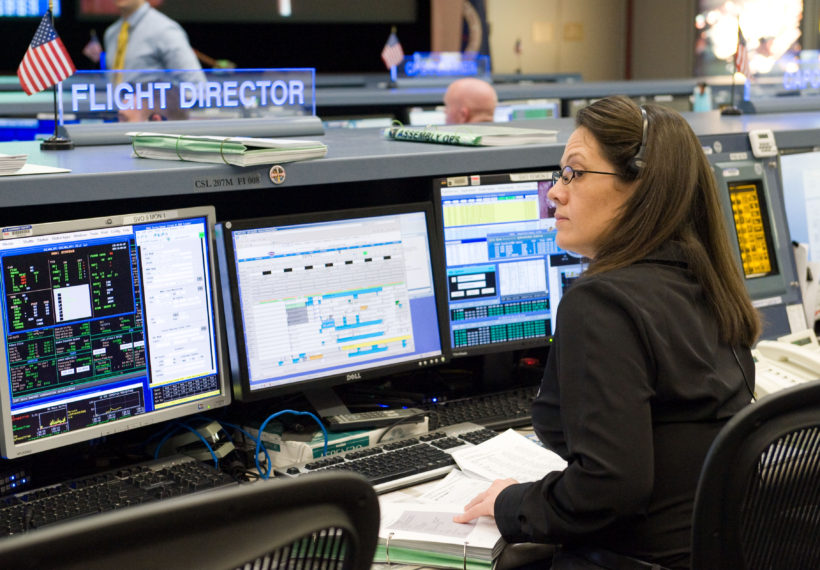 Picture of Flight Director Emily Nelson in NASA Mission Control at the Johnson Space Center.