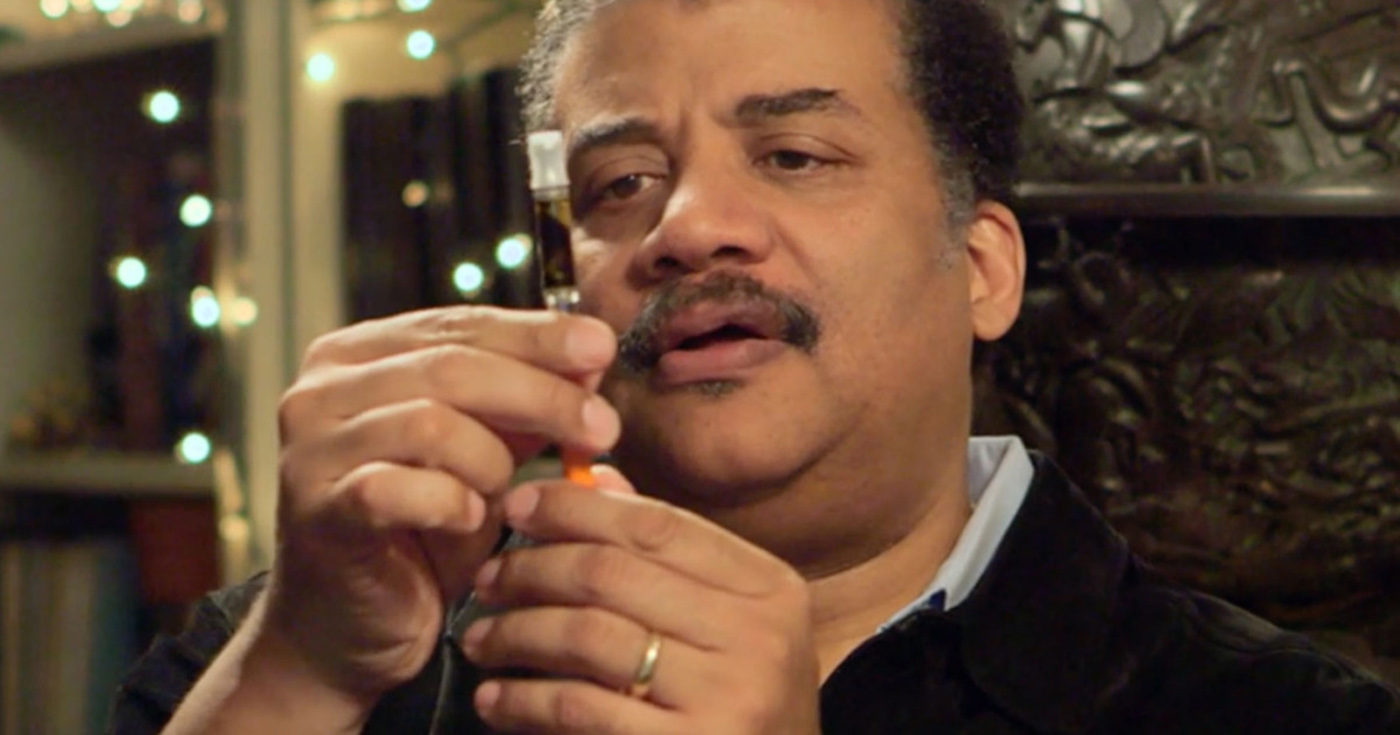 In this photo, courtesy of National Geographic Channel, Neil deGrasse Tyson inspects Whoopi Goldberg's Vape Pen. 