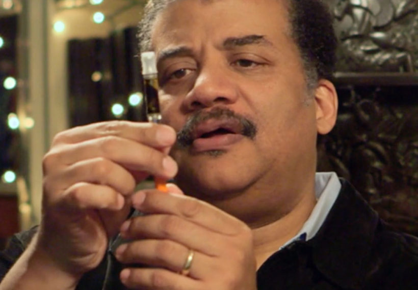 Neil deGrasse Tyson looks at Whoopi Goldberg's Vape Pen. Courtesy of National Geographic Channel.