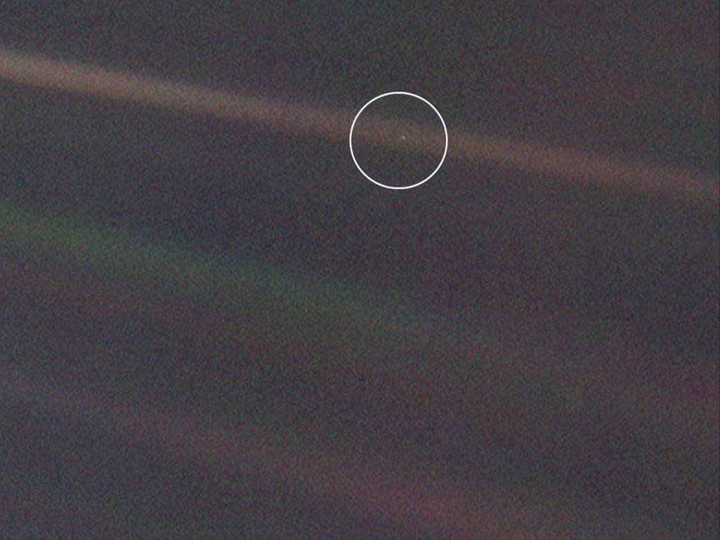 Voyager 1 photo of Earth, The Pale Blue Dot. Credit: NASA.