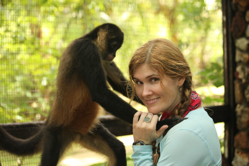 Jairo Batista Bernal's photo of primatologist Natalia Reagan with “Cantinflas” - a critically endangered Azuero spider monkey endemic to the Azuero peninsula in Panama.
