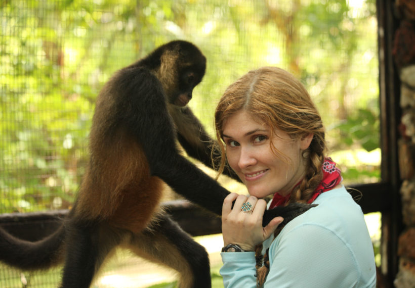 Jairo Batista Bernal's photo of primatologist Natalia Reagan with “Cantinflas” - a critically endangered Azuero spider monkey endemic to the Azuero peninsula in Panama.
