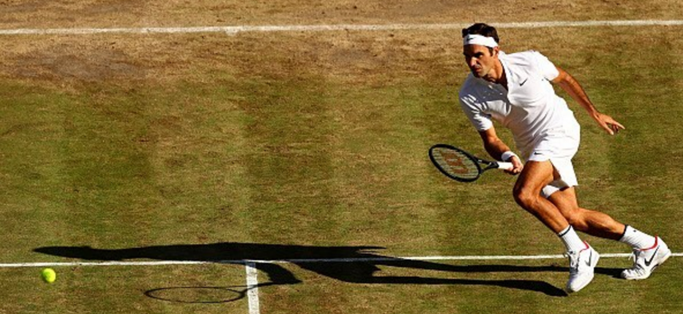 Photo of Roger Federer returning a shot, courtesy of Wilson.com
