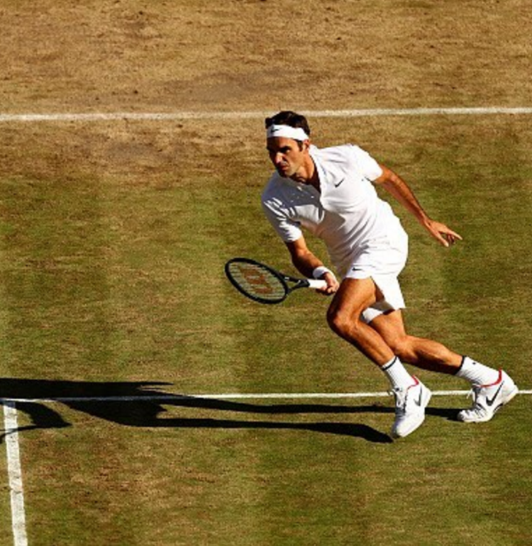Photo of Roger Federer returning a shot, courtesy of Wilson.com