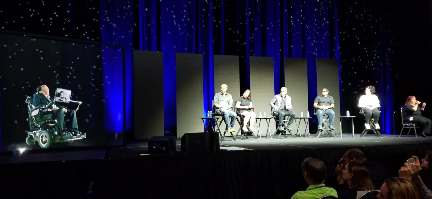 Stacey Severn’s photo of StarTalk Live! from FutureCon, showing holographic Stephen Hawking, Scott Adsit, Katherine Pratt, Chris Hadfield, Suveen Mathaudu, and Maeve Higgins