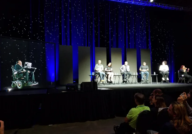 Stacey Severn’s photo of StarTalk Live! from FutureCon, showing holographic Stephen Hawking, Scott Adsit, Katherine Pratt, Chris Hadfield, Suveen Mathaudu, and Maeve Higgins