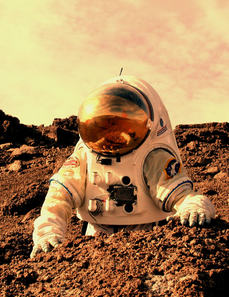 Image of an astronaut on Mars. Photo credit: NASA Haughton-Mars Project/Pascal Lee 010808-0013.