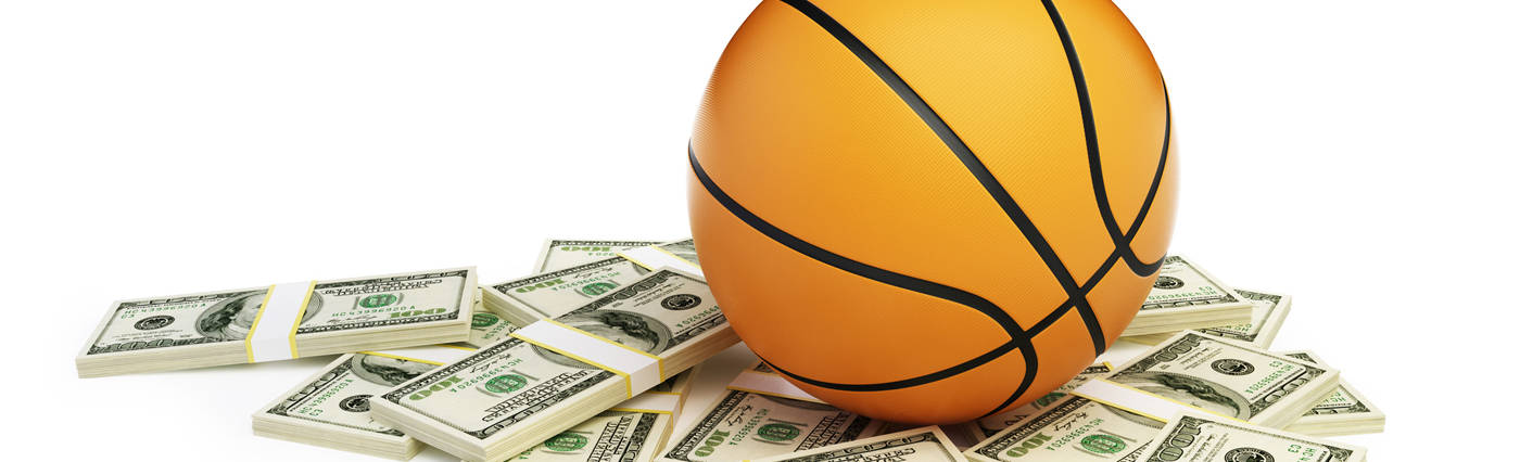 Photo of basketball and money for Playing with Science podcast, NCAA March Madness, Money and Minds. Credit: 3dfoto/iStock.