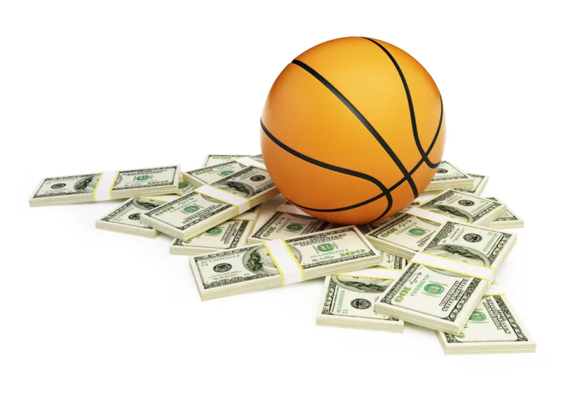Photo of basketball and money for Playing with Science podcast, NCAA March Madness, Money and Minds. Credit: 3dfoto/iStock.