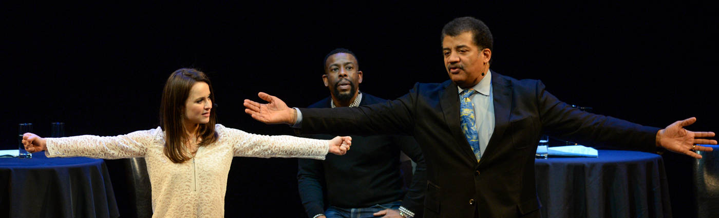 Elliot Severn’s photo of Sasha Cohen, Chuck Nice and Neil deGrasse Tyson on stage at Playing with Science at BAM.