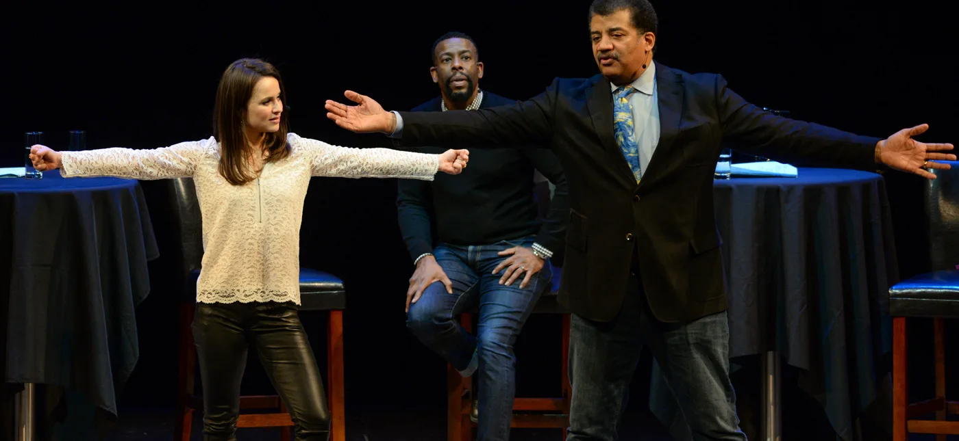 Elliot Severn’s photo of Sasha Cohen, Chuck Nice and Neil deGrasse Tyson on stage at Playing with Science at BAM.