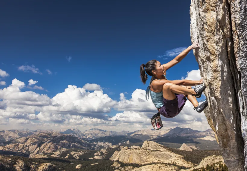 Photo of an extreme sport athlete climbing a mountain. Credit_gregepperson_iStock.