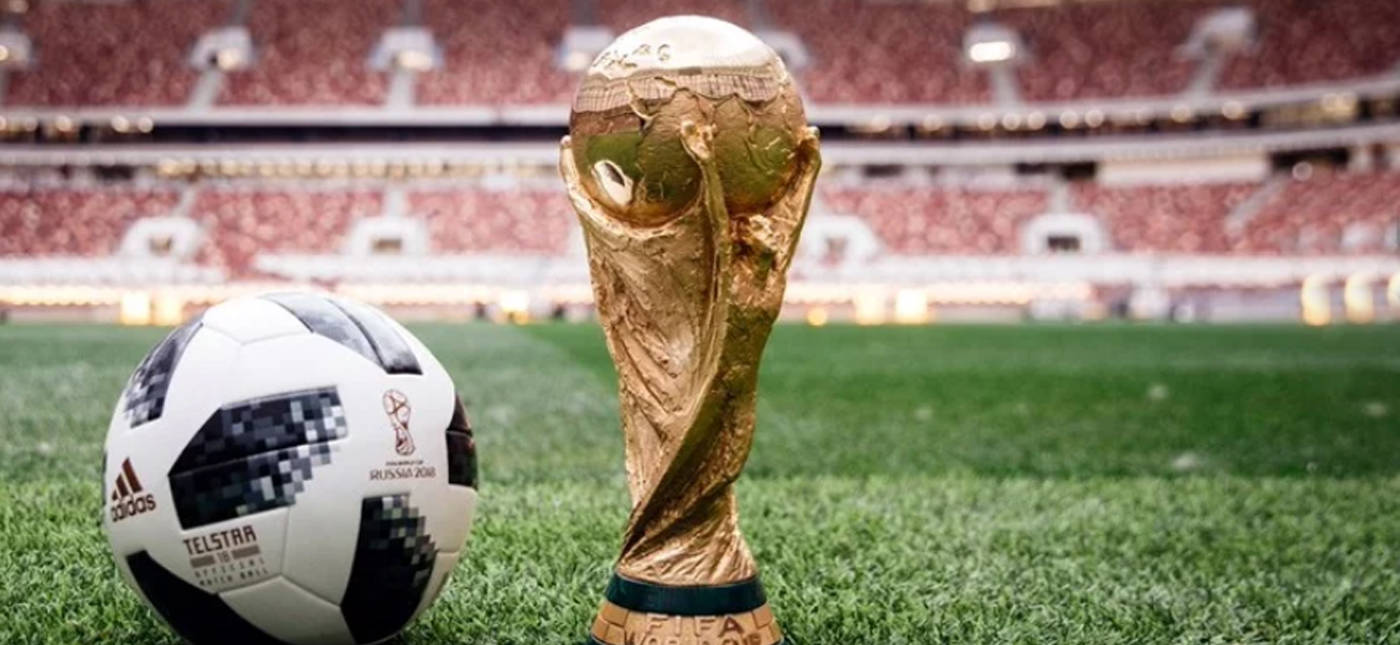 Adidas' photo of the Telstar 18 soccer ball and the 2018 World Cup trophy.