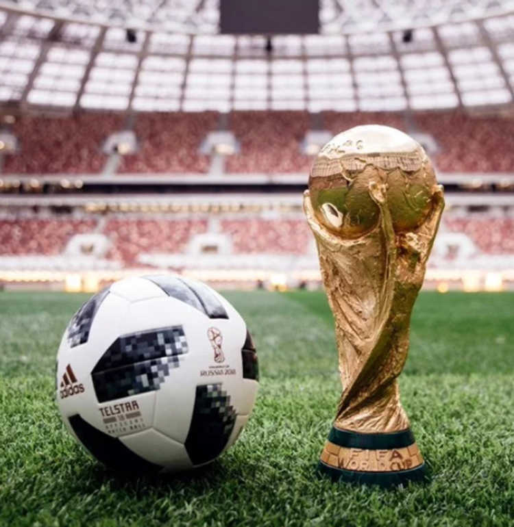 Adidas' photo of the Telstar 18 soccer ball and the 2018 World Cup trophy.