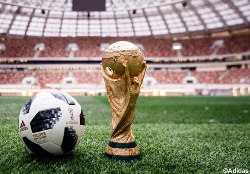 Adidas' photo of the Telstar 18 soccer ball and the 2018 World Cup trophy.
