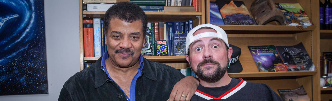 Brandon Royal’s photo of Neil deGrasse Tyson and Kevin Smith in Neil’s office at the Hayden Planetarium.