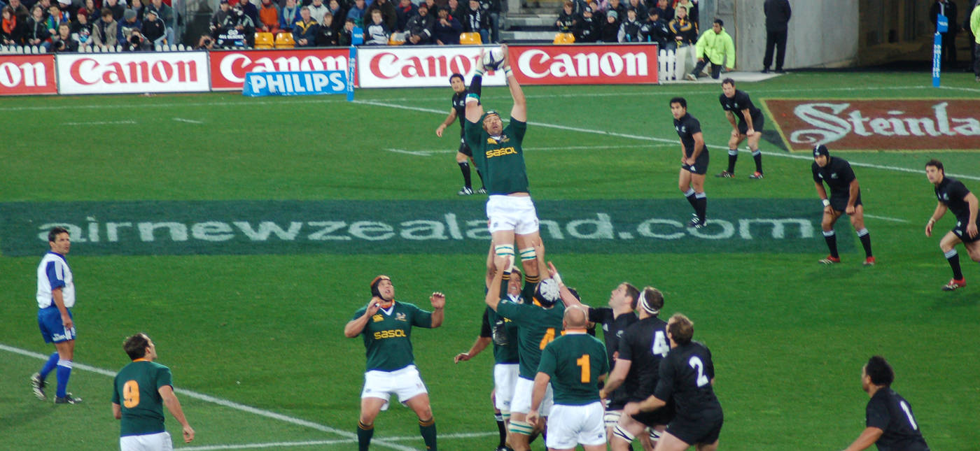Hamish McConnochie’s photo of South African Victor Matfield taking a line-out against New Zealand in 2006, via Wikimedia Commons.