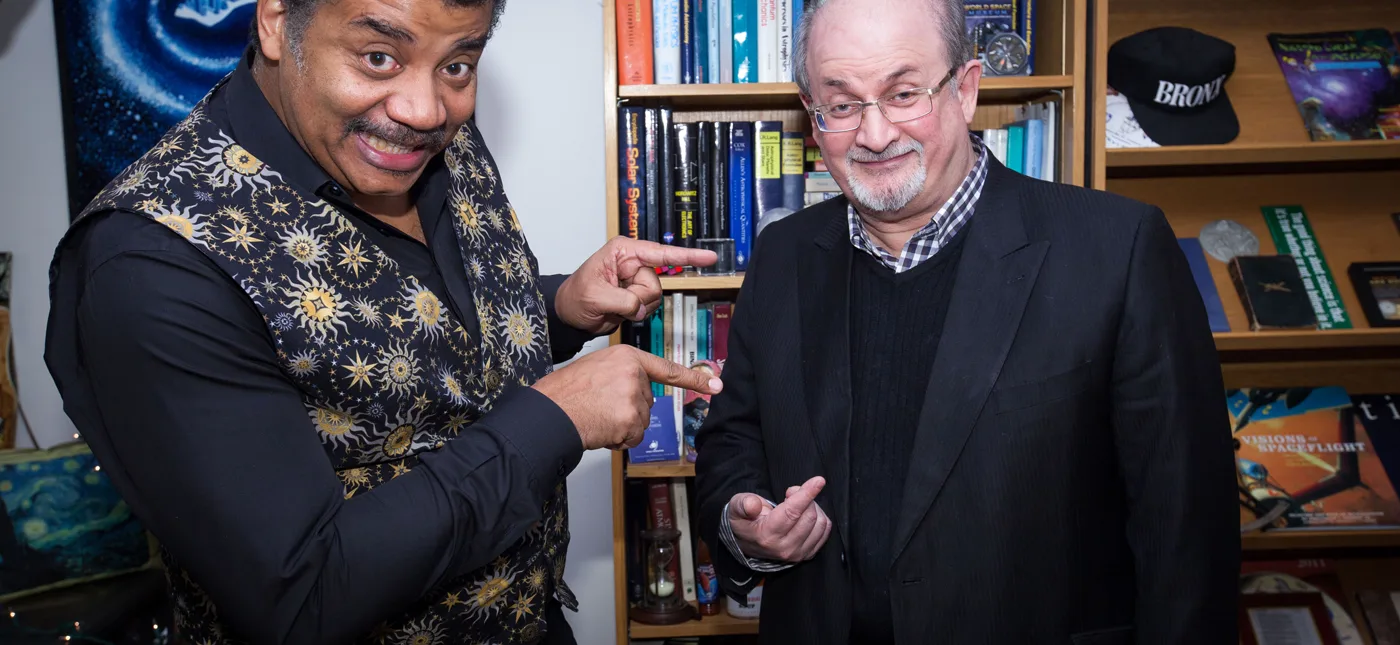 Brandon Royal’s photo of Neil deGrasse Tyson and Salman Rushdie in Neil deGrasse Tyson’s office at the Hayden Planetarium at the American Museum of Natural history.