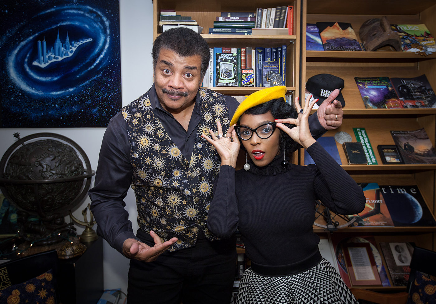 Brandon Royal’s photo of Neil deGrasse Tyson and Janelle Monáe in Neil’s office at the Hayden Planetarium.