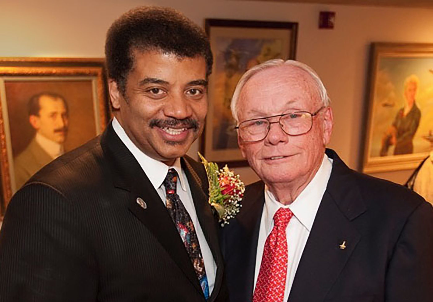 Photo of Neil deGrasse Tyson and Neil Armstrong taken on July 20, 2009 at the 40th Anniversary of Apollo 11 at the National Air and Space Museum. © Tyson Archives.