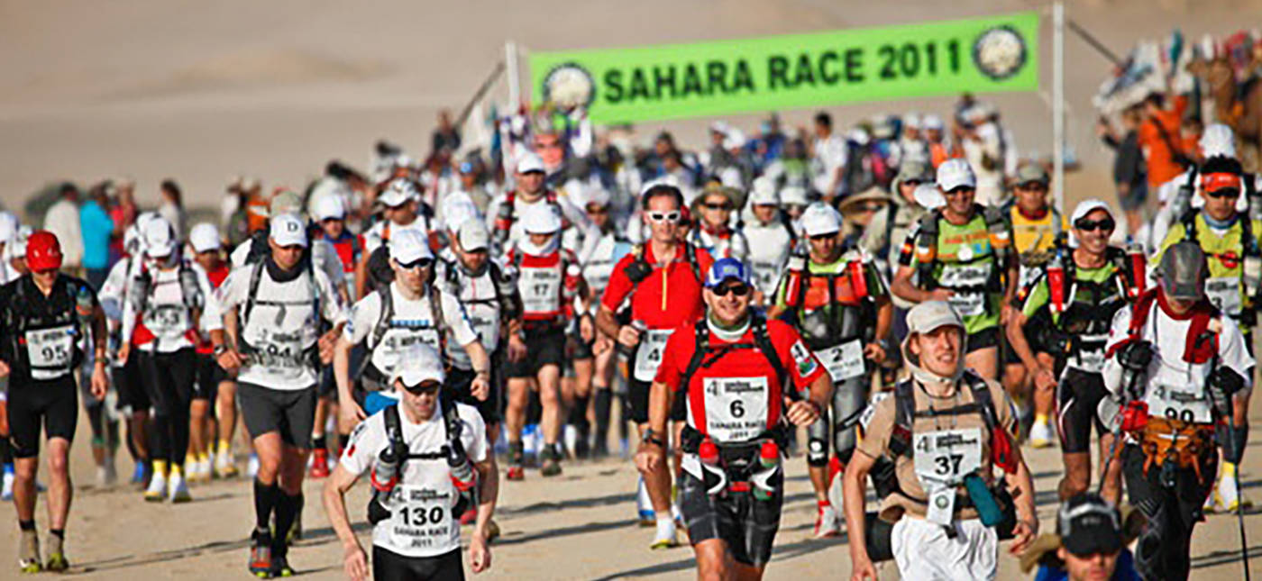 Photo of Ultramarathoners competing at the Sahara Race 2011. Photo Credit: John Doe, from Wikimedia Commons.