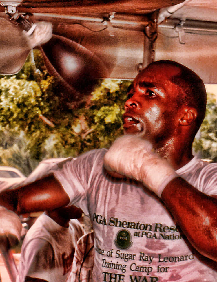 Mark Mathosian’s photo of Sugar Ray Leonard training for his upcoming rematch with Tommy "The Hitman" Hearns at the Sheraton Resort in Palm Beach Gardens, Florida, May, 1989, via Wikimedia Commons.