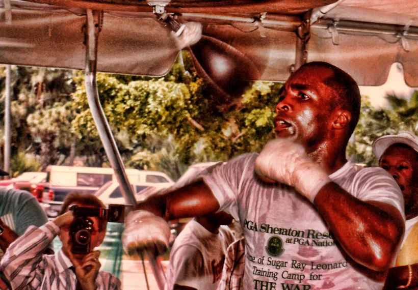 Mark Mathosian’s photo of Sugar Ray Leonard training for his upcoming rematch with Tommy "The Hitman" Hearns at the Sheraton Resort in Palm Beach Gardens, Florida, May, 1989, via Wikimedia Commons.
