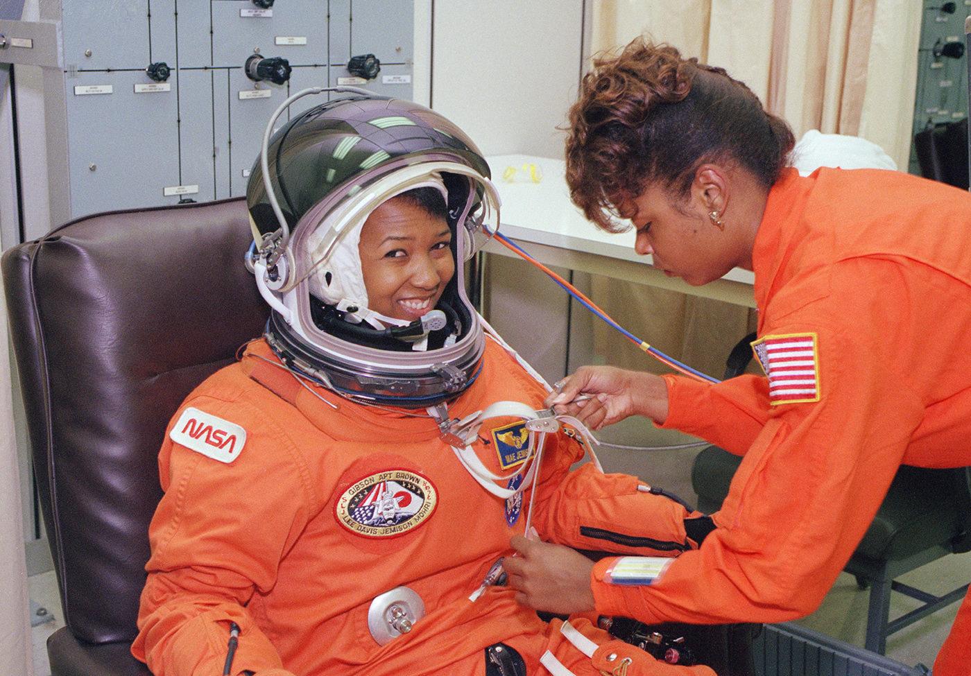 NASA photo of astronaut Dr. Mae Jemison, MD, suiting up for her historic space shuttle flight, NASA’s first by an African-American woman or woman of color.