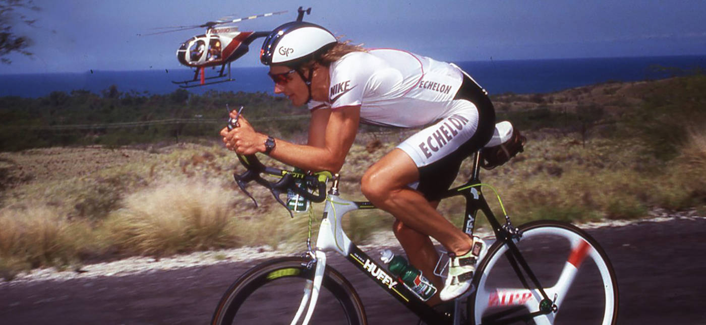 Photo of Ironman Champion Mark Allen during the bike phase of the race, courtesy of Mark Allen.