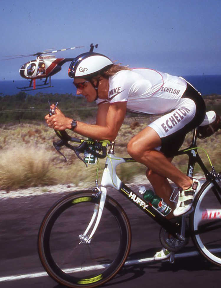 Photo of Ironman Champion Mark Allen during the bike phase of the race, courtesy of Mark Allen.
