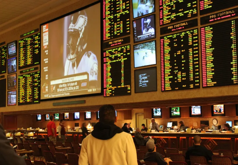 Baishampayan Ghose's photo of Las Vegas race and sports book, via Wikimedia Commons [CC BY-SA 2.0 (https://creativecommons.org/licenses/by-sa/2.0)].
